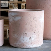 Aurella cylinder planter in blushstone pigmented concrete with matte pink textured finish 70cm large cylinder planter