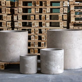 Rustic gray concrete extra large cylinder planter with textured weathered finish aurella truffle 70cm 199l round pot