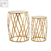 Avantis set of 2 gold metal side tables with cross design lattice and clear mirrored tops for stylish living spaces