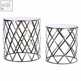 Set of two diamond design silver cylindrical side tables with mirrored glass tops and geometric metal frames
