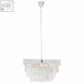 Babylon six bulb chrome chandelier with sleek chrome finish and clear crystal prisms hanging from white metal frame