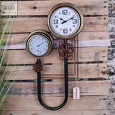 Baded pipe industrial wall clock with brass dials black metal pipes and red valve accents industrial wall clock