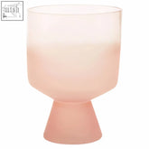 A translucent small matte pink glass goblet with frosted finish and tapered base perfect as a pink glass vase