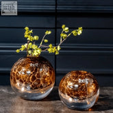 Two mouth blown glass ball vases in crackled amber bronze gold finish from dutz collection with duz logo