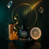 Black glass reed diffuser with barking ginger essential oil and black reeds for a fresh aromatic scent