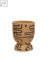 Tan ceramic egg cup with black geometric patterns hand painted earthenware planter with painted earthenware planter style