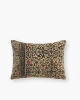 Rectangular bea floral vintage kilim cushion with intricate floral vintage kilim patterns in muted earth tones on beige