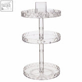 Clear acrylic three tier revolving cosmetic organiser with faceted diamond cut edges for beauty display