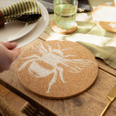 Round portuguese cork place mat with a white bee design perfect as a natural cork place mat for any table