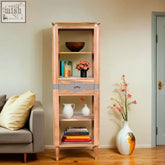 Light wood berkley acacia wood bookcase with gray striped drawer and rounded top edges in acacia wood finish