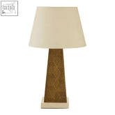 Beige berkley table lamp with a geometrically patterned brown marble base and cream fabric shade