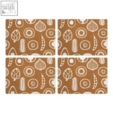 Brown cork rectangular placemats with white botanical pattern from the besa set of four cork rectangular placemats