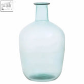 A translucent light blue small bottle neck recycled glass vase with a slender neck and rounded body by bexley blue
