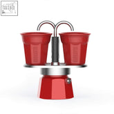 Red bialetti mini express coffee maker with silver accents and two matching cups for double serve espresso