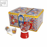 Vibrant red and blue dolce gabbana espresso maker with ornate floral design in bialetti sicilian cart gift set