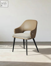 Beige leather bianchi dining chair with textured gray fabric seat and black metal legs perfect for dining room chairs offer