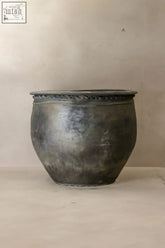 Antique dark gray metal grey asian pots with textured hammered surface and decorative braided rim big old grey asian pots