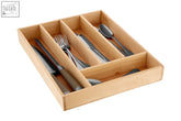Light-colored birchwood cutlery tray with five compartments holding silverware featuring durable construction