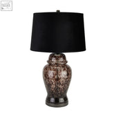 A sleek black dapple acanthus lamp with a glossy brown marbled ceramic base and black fabric shade