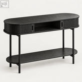 Black fluted console table with ribbed drawers and lower shelf for sliding storage and display