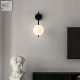 Minimalist black globe wall lamp with frosted white glass spherical shade modern globe wall light