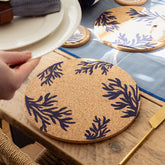 Round portuguese cork place mat with navy blue coral branch design for stylish table decor