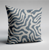 Square blue wiggle throw cushion with bold abstract white and navy wavy lines on textured fabric scatter cushion