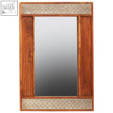 Boho acacia wood wall mirror with warm brown rectangular frame and decorative textured panels on top and bottom