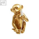Boho gold finish monkey table lamp with vintage bulb and white cord for stylish table lighting