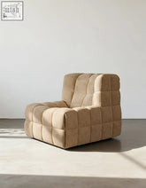Beige tufted bongani lounge chair with quilted cube design and soft corduroy fabric perfect for living room lounge chairs
