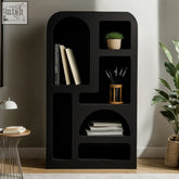 Black modern tall geometric bookcase otis large with matte black finish holding books potted plant and art supplies