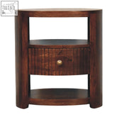 Dark brown bordeaux bedside table made of natural mango wood with curved frame and slatted drawer with brass knob