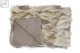 Bosie lamina natural fur throw with beige brown animal print faux fur and solid taupe lining for cozy use