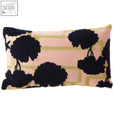 Pink rectangular bosie ozella floral design cushion with black embroidered tree silhouettes and gold geometric accents