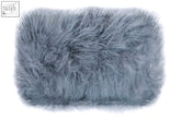 A plush light blue rectangular pouch with soft faux fur texture in bosie real mongolian fur style