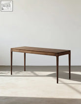 Boucher office desk with storage is a sleek dark brown solid wood office desk with three front drawers and minimalist design