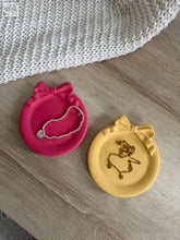 Pink and yellow ceramic bow trinket dishes perfect for holding jewelry and small accessories
