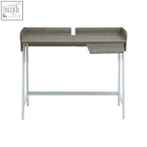 Modern gray wood-grain light oak desk with sleek white metal legs and a built-in drawer ideal for workspaces