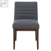 Dark gray upholstered Brando charcoal grey dining chair with vertical ribbed texture and oak legs