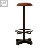 Brown leather round seat bar stool with black metal frame and footrest perfect for kitchen or bar seating