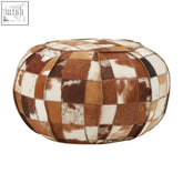 Brown and white buffalo leather patchwork pouffe featuring a cowhide design perfect for living room seating