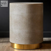 Cadio shagreen round stool with a textured light grayish brown shagreen surface and polished gold base side table