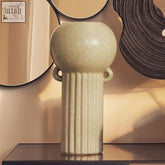 Beige ceramic calcita large speckled green vase with rounded top fluted body and two small looped handles