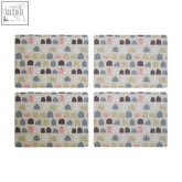 Set of four wild cottage placemats with pastel pink gray and green house patterns on beige for cozy dining
