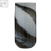 A tall brushstroke vase with a rounded base featuring a muted grey and black swirling marbled pattern