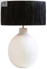 White ceramic table lamp with a black raffia shade for stylish modern lighting and decor