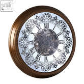 Bronze framed cayton wall clock with ornate black roman numerals and visible mechanical gears on wall clock display