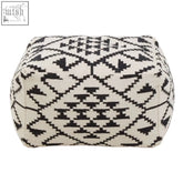 Black and white geometric patterned woven berber style pouffe perfect for casual seating and home decor