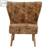 A cefena leopard print velvet armchair with a curved back and wooden legs perfect for cozy seating