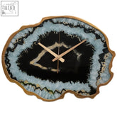 Celina black and gold agate effect wall clock with sleek gold agate frame and black light blue crystalline layers design